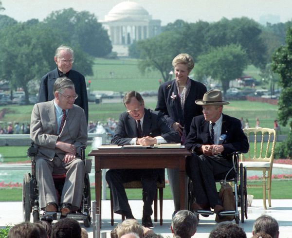 ada-george-bush-signing